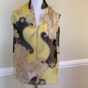 13”x 62” oblong silky scarf in a post modern print of yellow black gold & cream